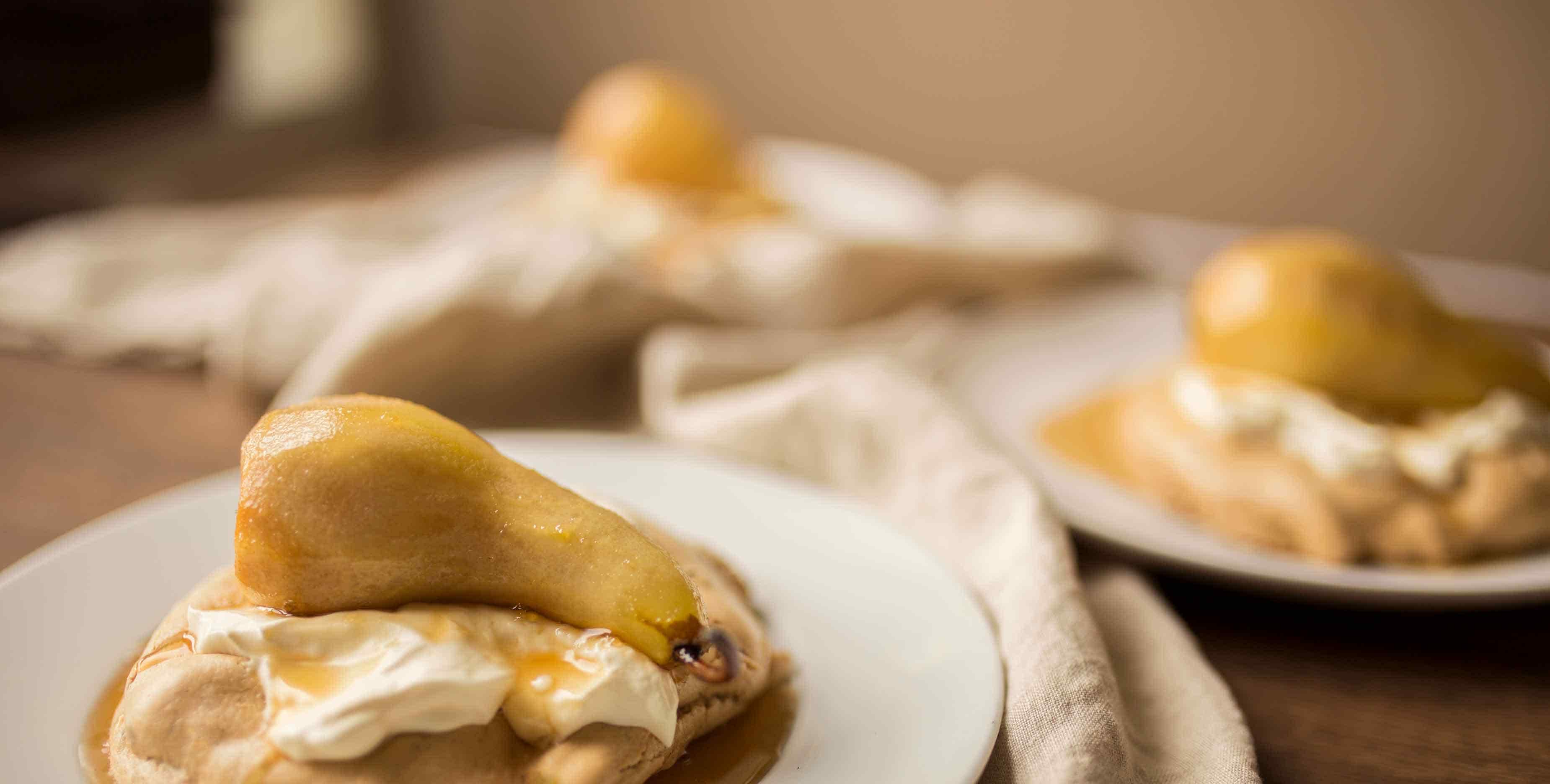 Pears poached in oolong tea, with brown sugar meringue.